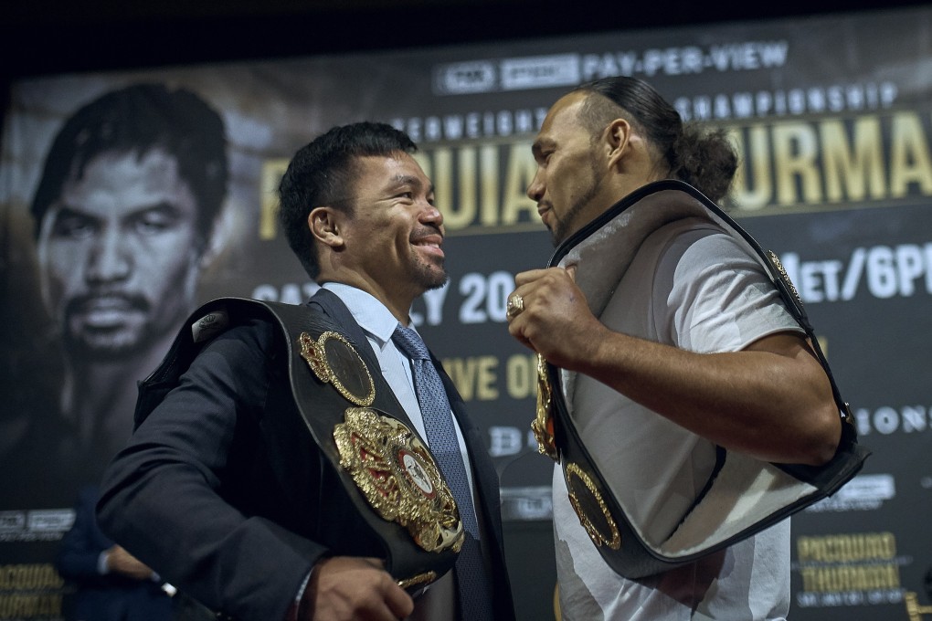 Manny Pacquiao and Keith Thurman stand face to face during their news conference in New York. The two are set to fight in a welterweight world championship boxing bout on July 20 in Las Vegas. Photo: AP