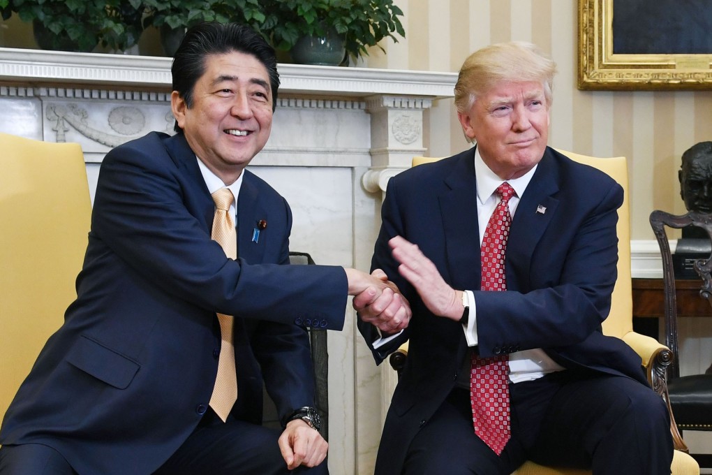 Japanese Prime Minister Shinzo Abe and US President Donald Trump at the White House. Photo: Kyodo