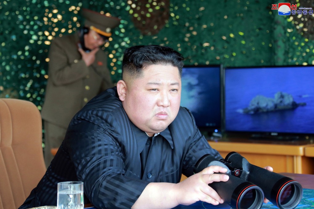 A photo released in May shows Kim Jong-un observing tests of different weapons systems in North Korea. Photo: Korea News Service via AP