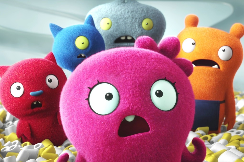 Moxy (front, voiced by Kelly Clarkson) and friends in a still from UglyDolls. Pitbull and Ice T voice other parts.