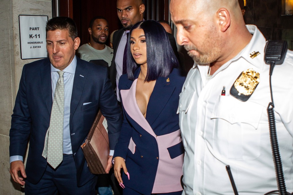 Rapper Cardi B pleads ‘not guilty’ on strip club brawl charges, dressed