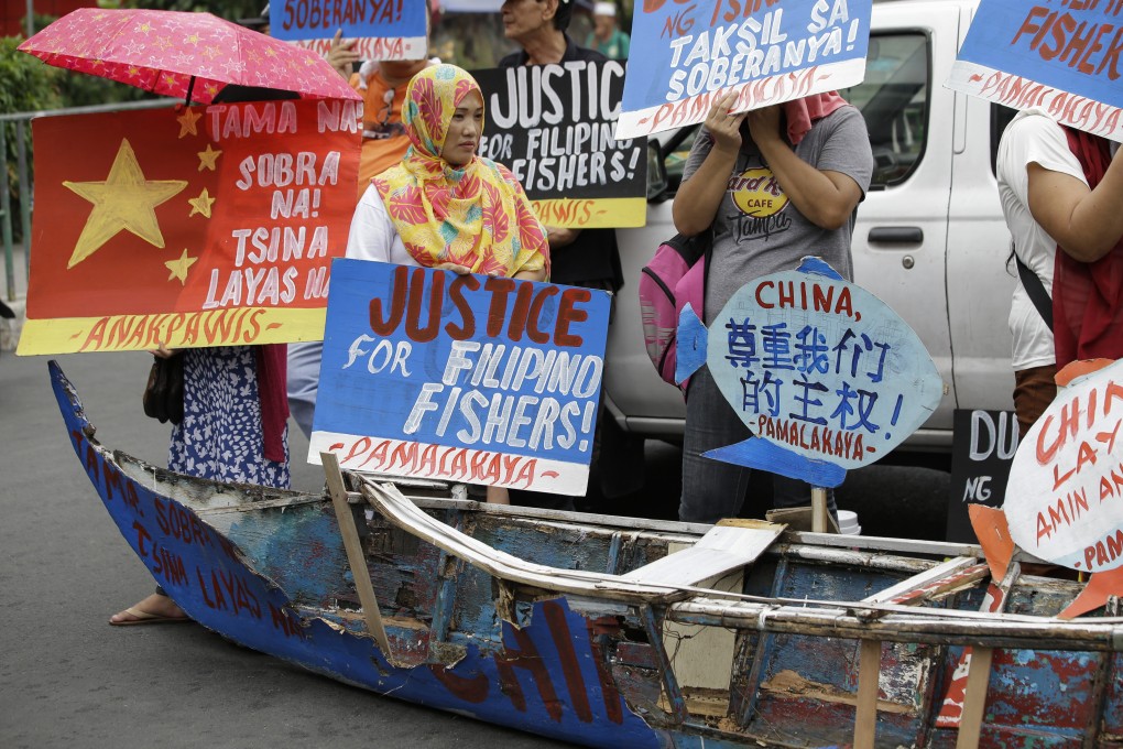 The sinking of a Philippine boat by a Chinese vessel has sparked an outcry in the Philippines, with a rally taking place outside the presidential palace in Manila on June 19. Photo: AP