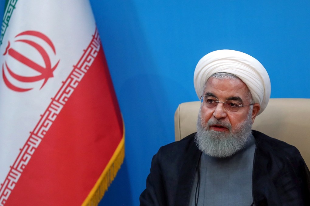 handout photo made available by presidential office shows Iranian President Hassan Rowhani during a meeting with health ministry officials in Tehran. Photo: EPA-EFE