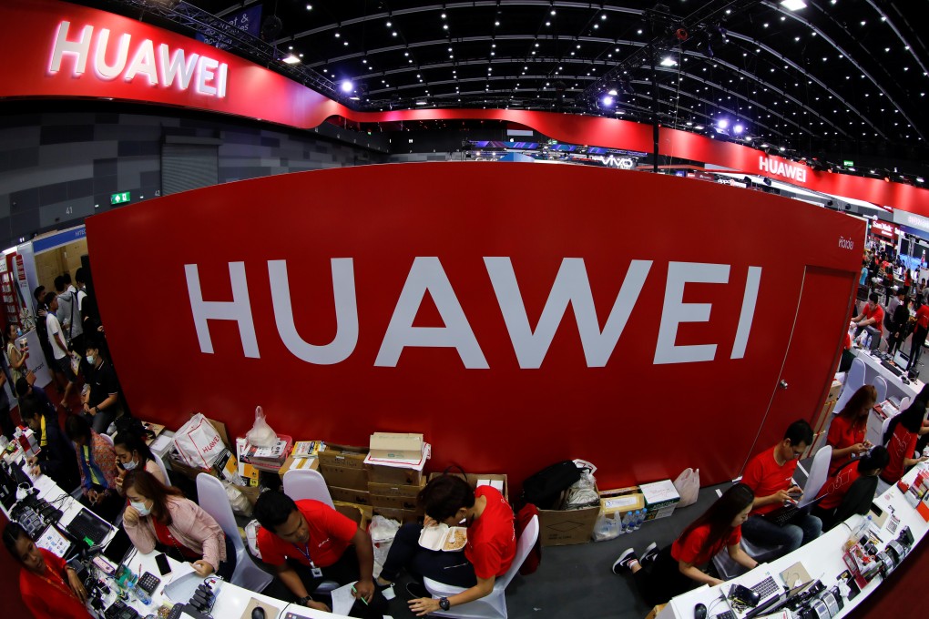 Workers sit a the Huawei stand at the Mobile Expo in Bangkok, Thailand May 31, 2019. Photo: Reuters