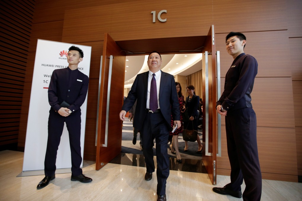 Huawei's chief legal officer Song Liuping leaves after a news conference on Huawei's ongoing legal action against the US government. Photo: Reuters