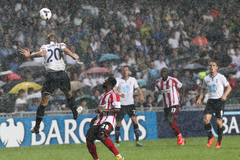 Tottenham Hotspur and Sunderland clash on what was called a “killer pitch” at Hong Kong Stadium in 2013.