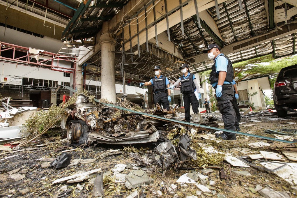 A forensics unit inspects the site of a deadly bomb blast in Pattani in 2016. Photo: AFP