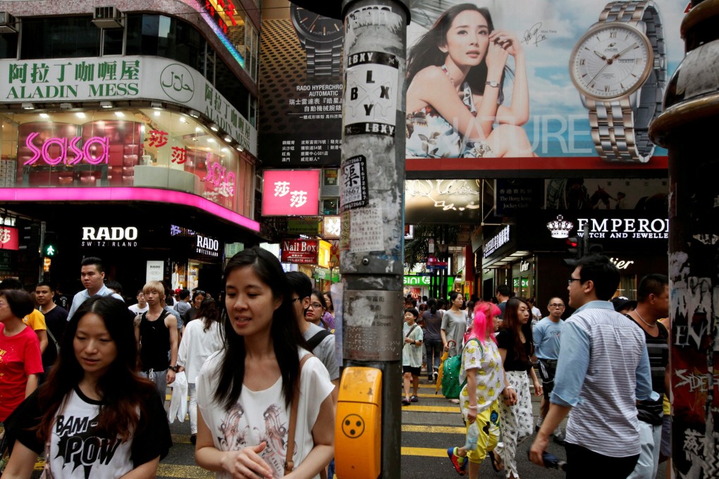 Shoppers in Causeway Bay, Hong Kong. PwC sees the city’s retail sales falling 5 per cent for the whole of 2019. Photo: Reuters