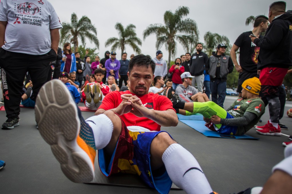 Manny Pacquiao trains in the morning with fans and friends at Pan Pacific Park in Los Angeles. Photo: AFP