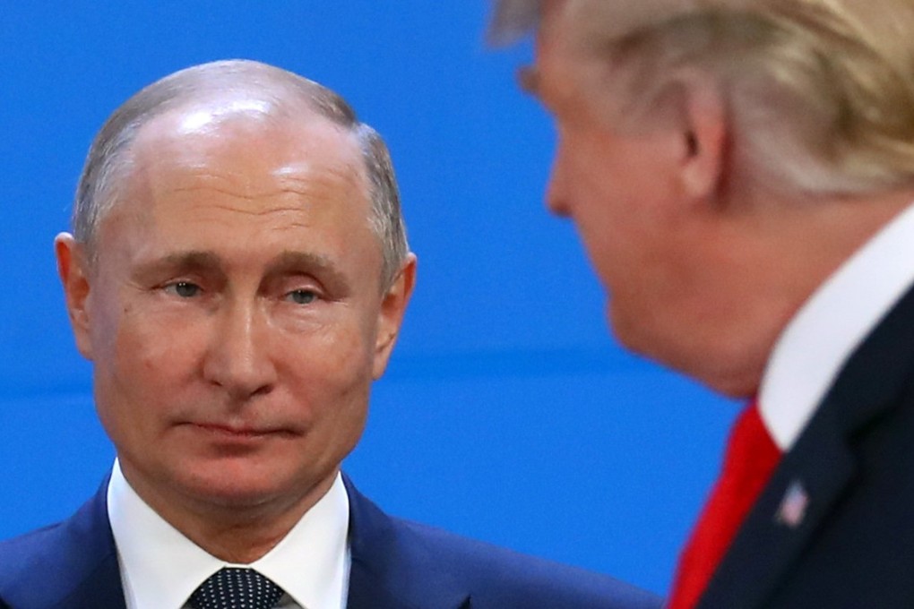 Russia's President Vladimir Putin and U.S. President Donald Trump are seen during the G20 summit in Buenos Aires, Argentina November 30, 2018. REUTERS/Marcos Brindicci