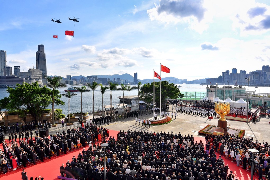 The Hong Kong government says thunderstorms could force the July 1 ceremony indoors, in contrast to the 20th anniversary event, which was basked in sunshine. Photo: AFP / Information Services Department