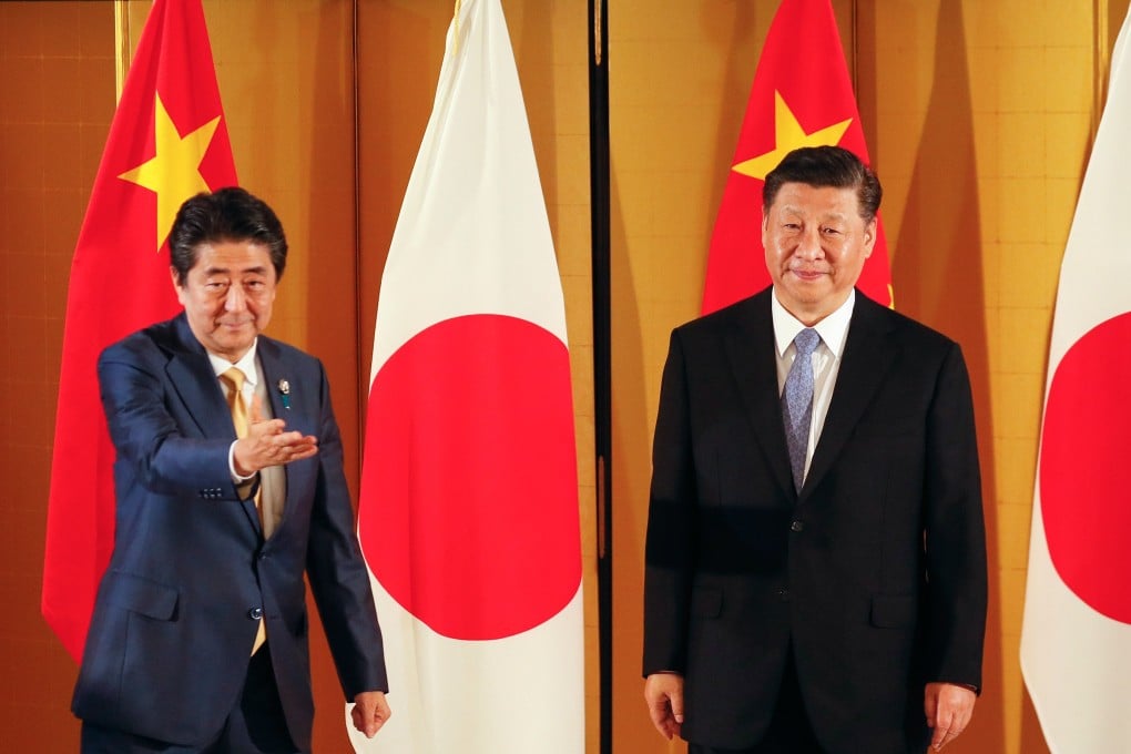 Shinzo Abe invited Xi Jinping to visit Japan in cherry blossom season next year. Photo: Bloomberg