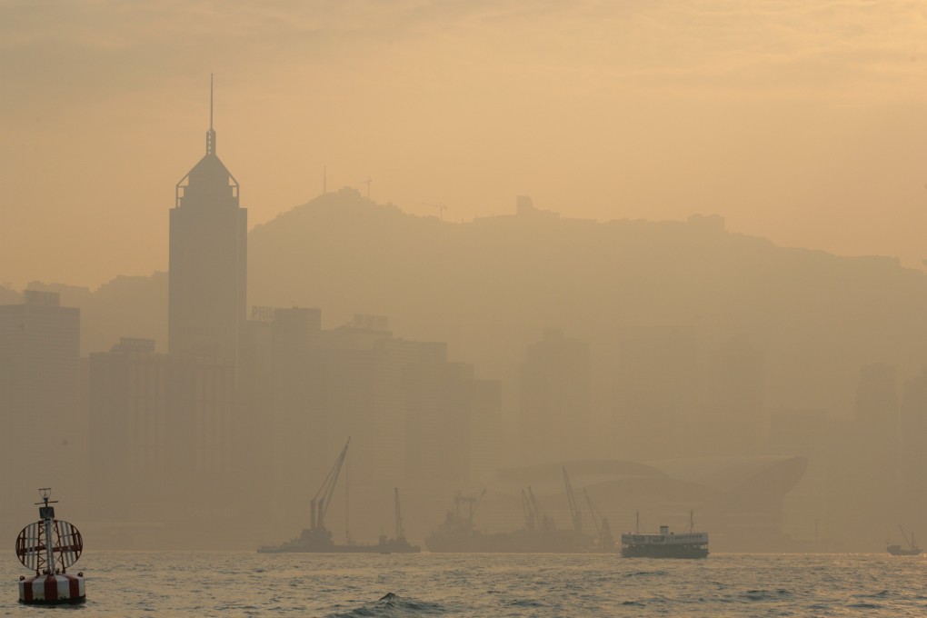 Hong Kong Island is obscured by haze during a high-pollution day in the city. Photo: SCMP