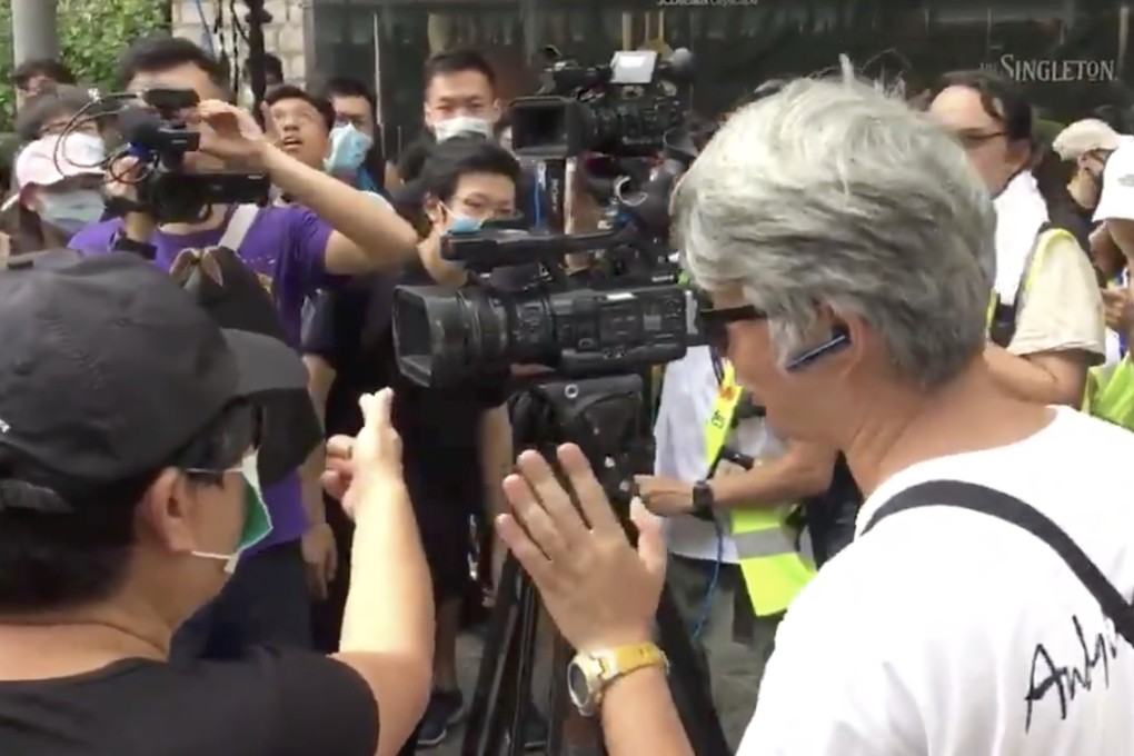 Press associations “strongly condemned” treatment of a video journalist at a rally outside Justice Place on Thursday. Photo: Twitter