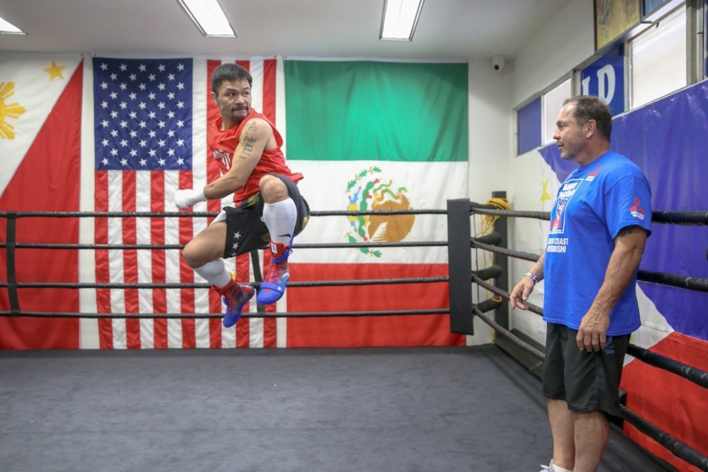 Manny Pacquiao jumps in the air and practises a kick during training. Photo: Twitter/Manny Pacquiao