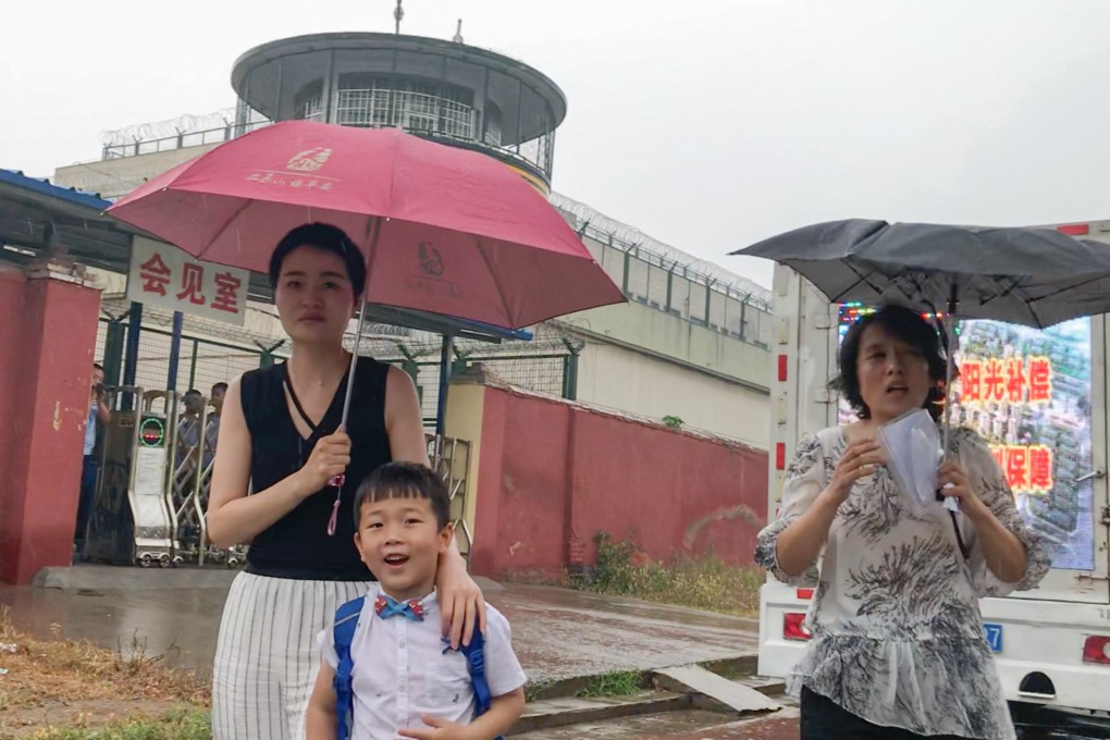 Li Wenzu and Wang Guangwei, the wife and son of jailed lawyer Wang Quanzhang, outside the prison in Shandong with his sister Wang Quanxiu (right). Photo: Handout