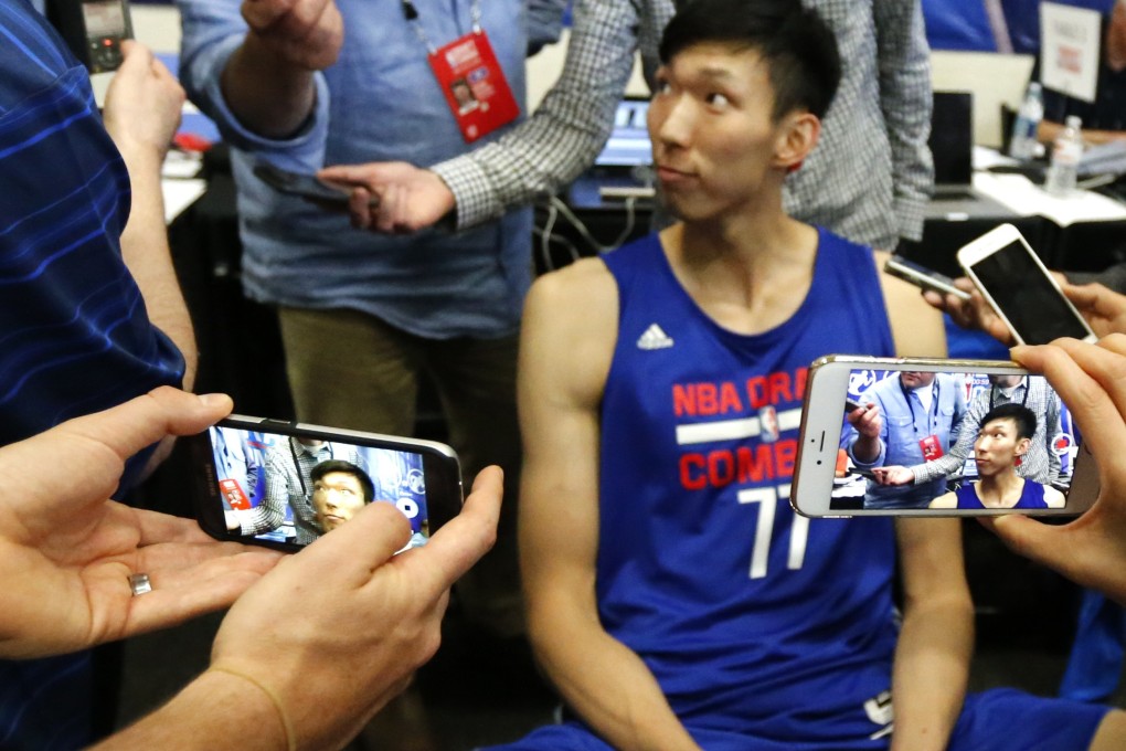 Zhou Qi, from China, speaks with reporters at the 2016 NBA draft basketball combine in Chicago. Photo: AP