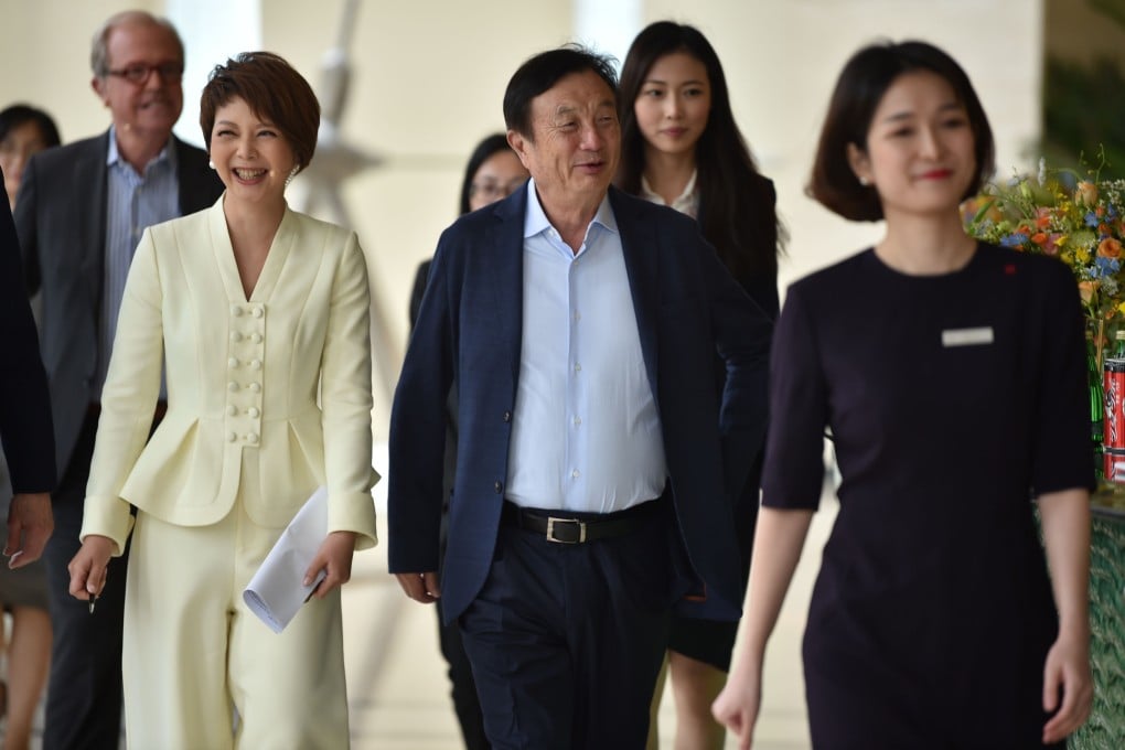 Huawei founder and CEO Ren Zhengfei, centre, arriving for a panel discussion in Shenzhen, China, this month. Photo: AFP