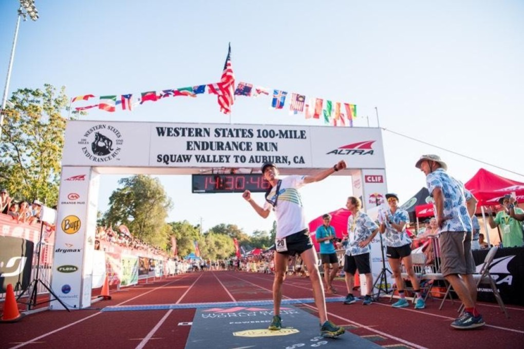 Jim Walmsley crosses the line in record time in 2018, but this year he went one better. Photo: Hoka One One