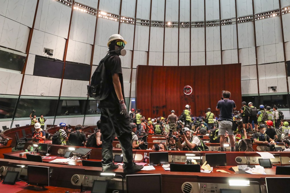 Protesters storm the Legislative Council Chamber on the 22nd anniversary of Hong Kong’s handover from Britain to China. Photo: Sam Tsang