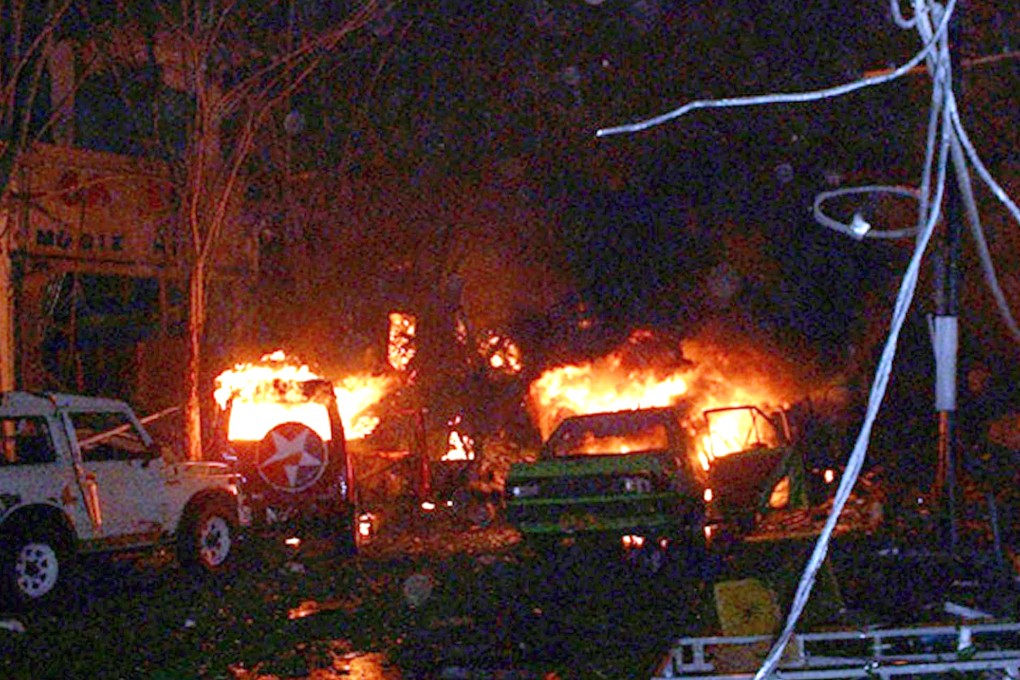 Buildings and cars burn after a bomb blast in Kuta, Bali, in October 2002. Arrested Jemaah Islamiah leader Para Wijayanto was involved in those attacks and many others, according to police. Photo: AFP