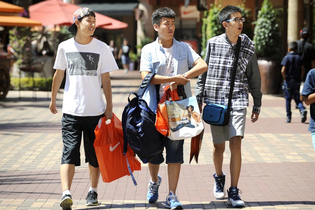 Chinese tourists shop in downtown Los Angeles. Photo: TNS