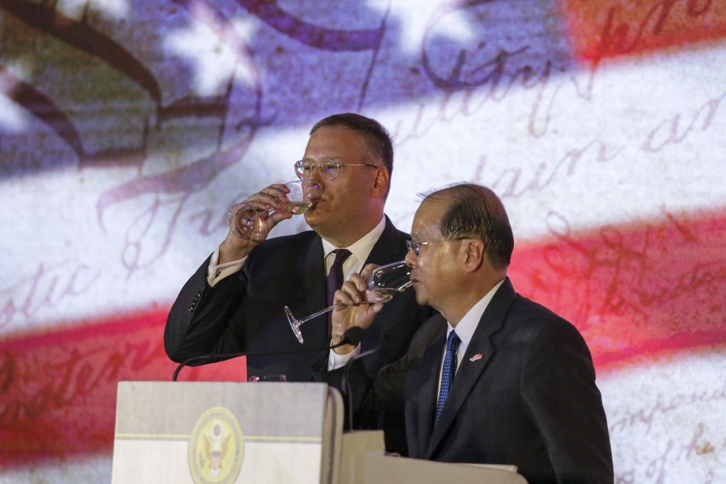 Kurt Tong (left), the US consul general to Hong Kong and Macau, and Chief Secretary Matthew Cheung on Tuesday in Aberdeen. Photo: Tory Ho