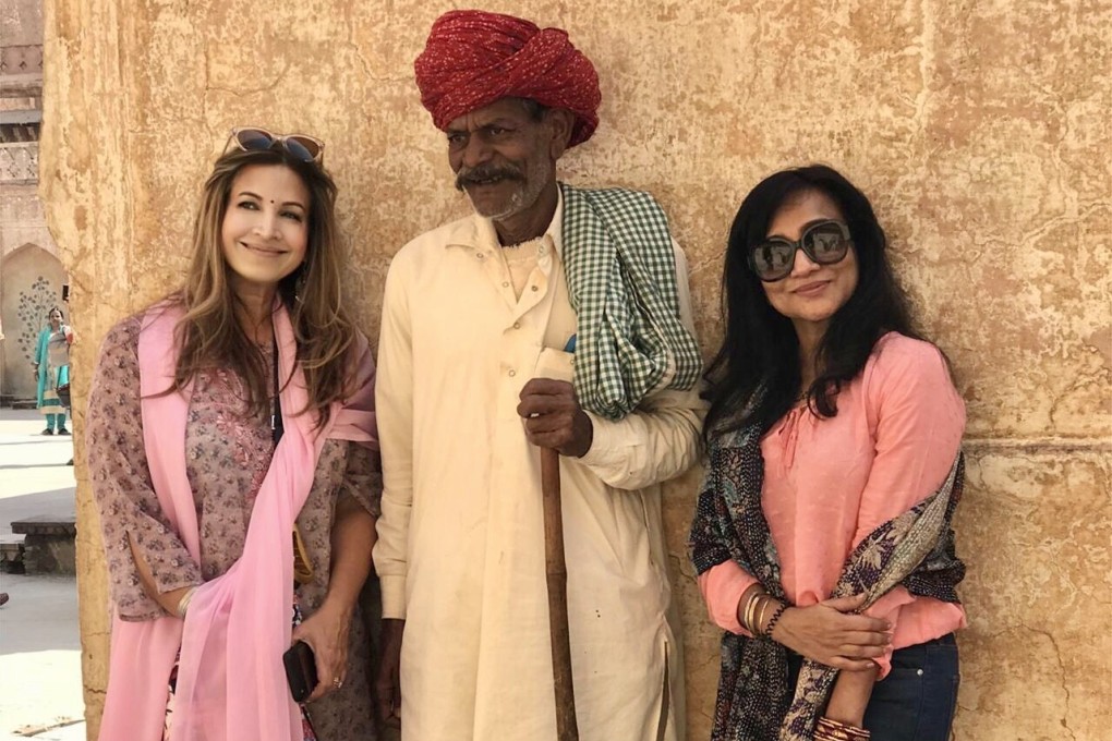 Nadine Gregory (left) and Angelique Manchanda-Peres (seen here with a man wearing typical Rajasthani clothing) set up women-only tours in India. Photo: courtesy of Tours n Detours