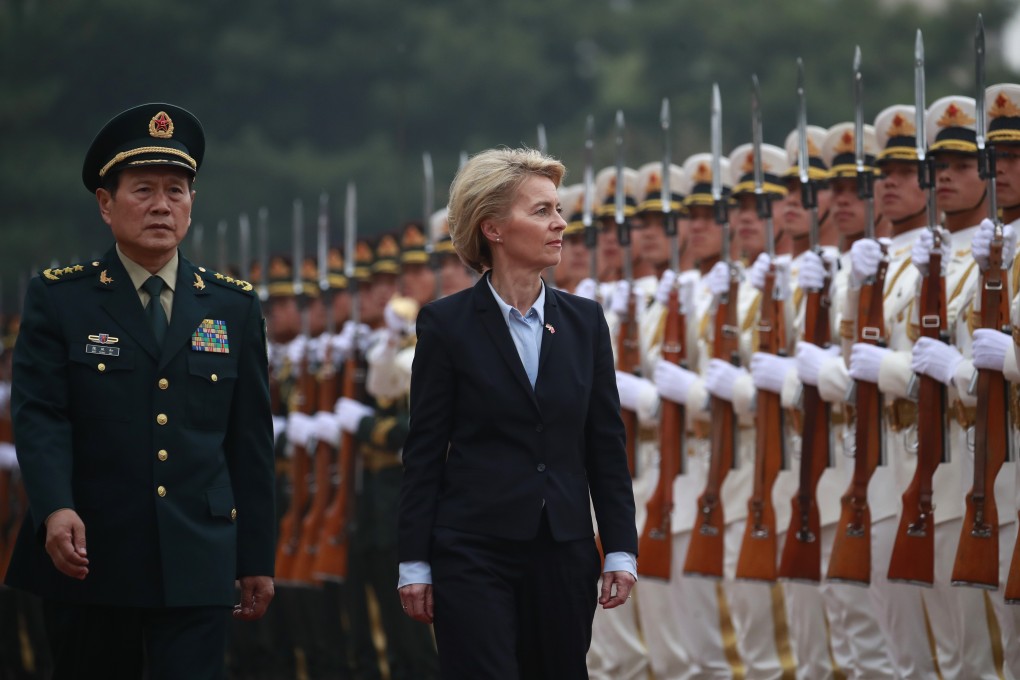 Ursula von der Leyen, in her capacity as German defence minister, attends a military honours ceremony with Chinese counterpart Wei Fenghe in Beijing last year. Photo: AFP