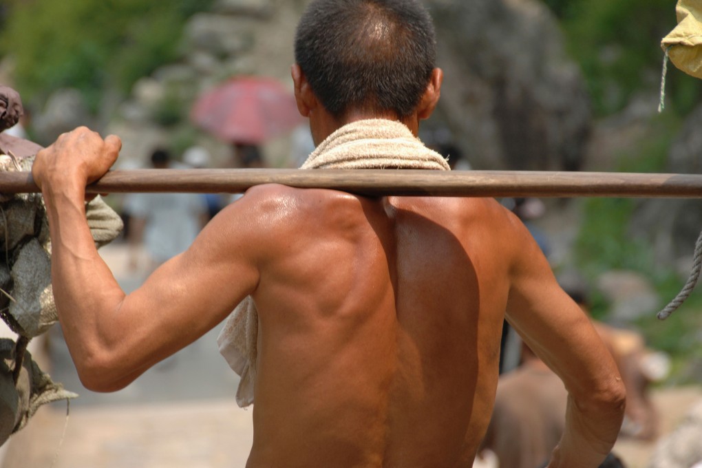Taking your shirt off in public in the east China city of Jinan is now punishable with a fine. Photo: Alamy