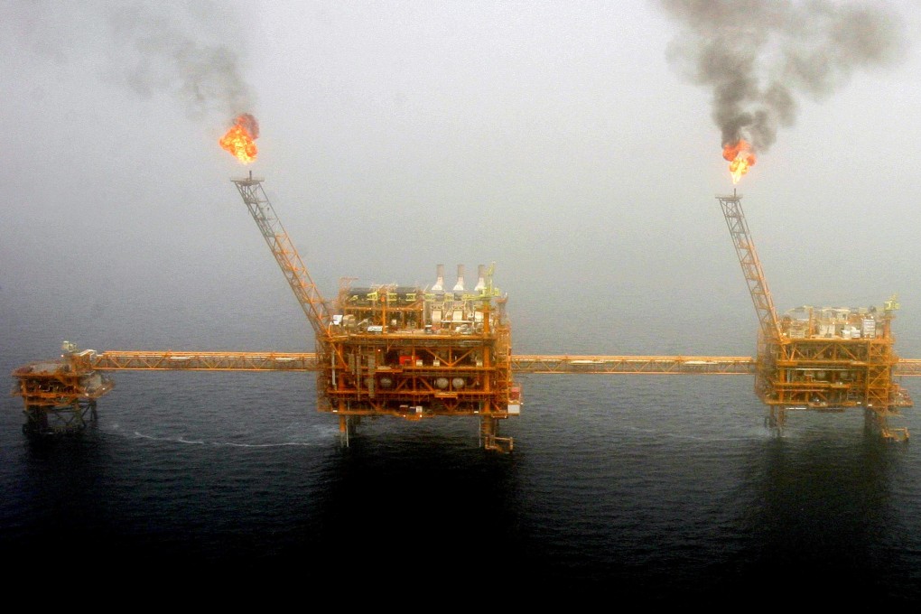 Gas flares from an oil production platform at the Soroush oilfields in the Persian Gulf, south of Tehran, in 2005. Photo: Reuters