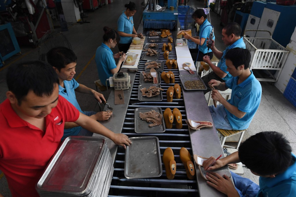 Wang Jie said his Yintong Shoes factory in Dongguan has continued to lose orders from the US in recent months. Photo: AFP