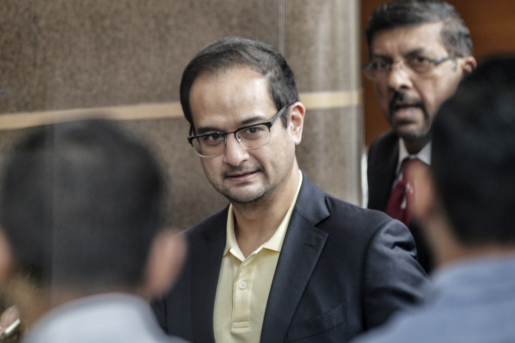 Riza Aziz (centre), was also questioned last year over allegations of theft and money laundering. Photo: EPA