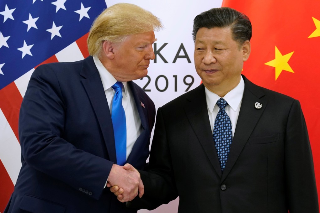 US President Donald Trump and China's President Xi Jinping shake hands ahead of their bilateral meeting during the G20 leaders summit in Osaka, Japan, on Saturday. Photo: Reuters