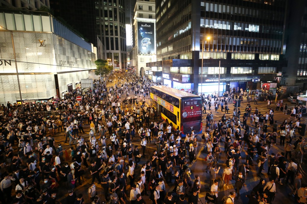 Anti-extradition protesters gather at the junction of Pedder Street and Des Voeux Road Central and Chater roads, in Central on June 12. Photo: Winson Wong