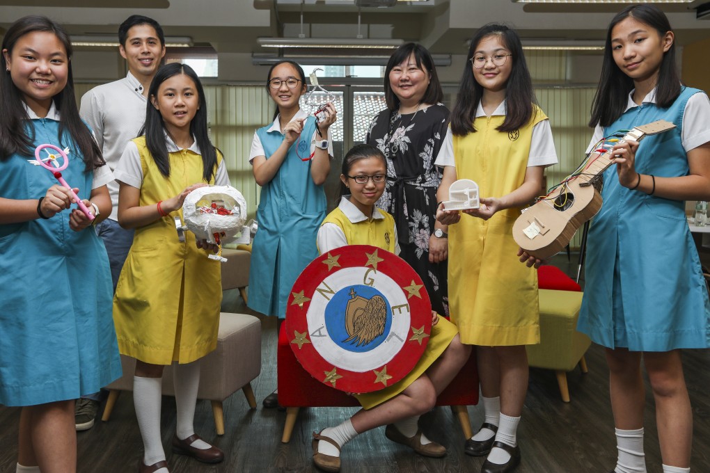 Department head Shirley Ann Fu (third right), teacher Thomas Lee and Secondary Two pupils, including Venice Hung (second right), show off the projects. Photo: Xiaomei Chen