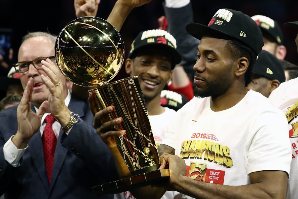 Kawhi Leonard celebrates with the Larry O’Brien Championship Trophy after the Toronto Raptors’ beat the Golden State Warriors to win game six of the 2019 NBA Finals. Photo: TNS