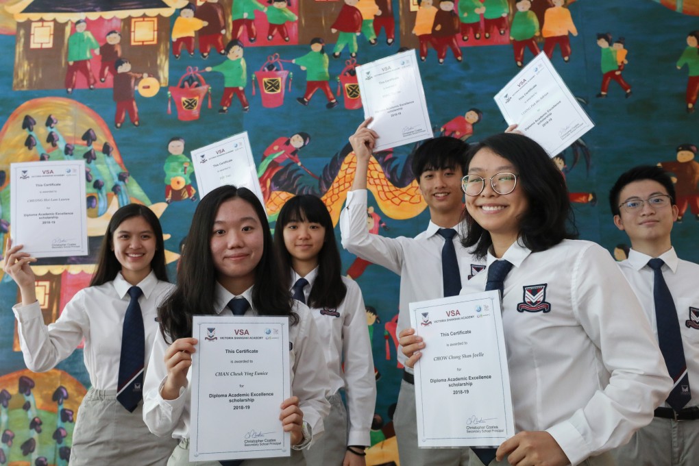 VSA students, with top scorer Joelle Chow (front, right) and schoolmate Adrian Leung (rightmost). Photo: Dickson Lee