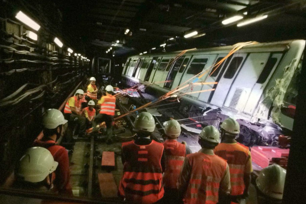 MTR staff carry out repairs after the crash between Central and Admiralty station. Photo: Handout
