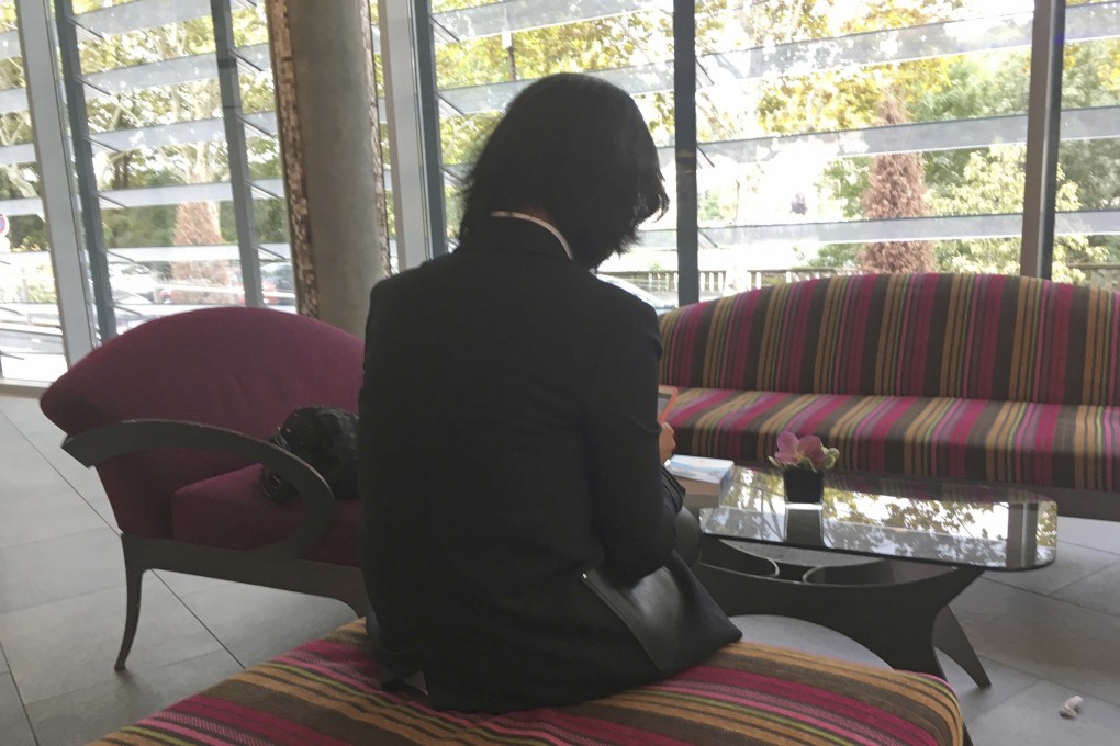 A 2018 photo of Grace Meng, the wife of the disgraced former Interpol President Meng Hongwei, who did not want her face shown. She has filed a lawsuit against Interpol. Photo: AP