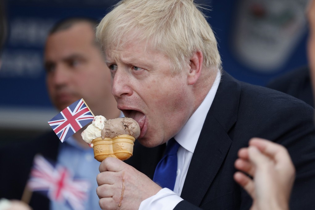 Boris Johnson, former UK foreign secretary, eats an ice cream cone while on the hustings. Photo: Bloomberg