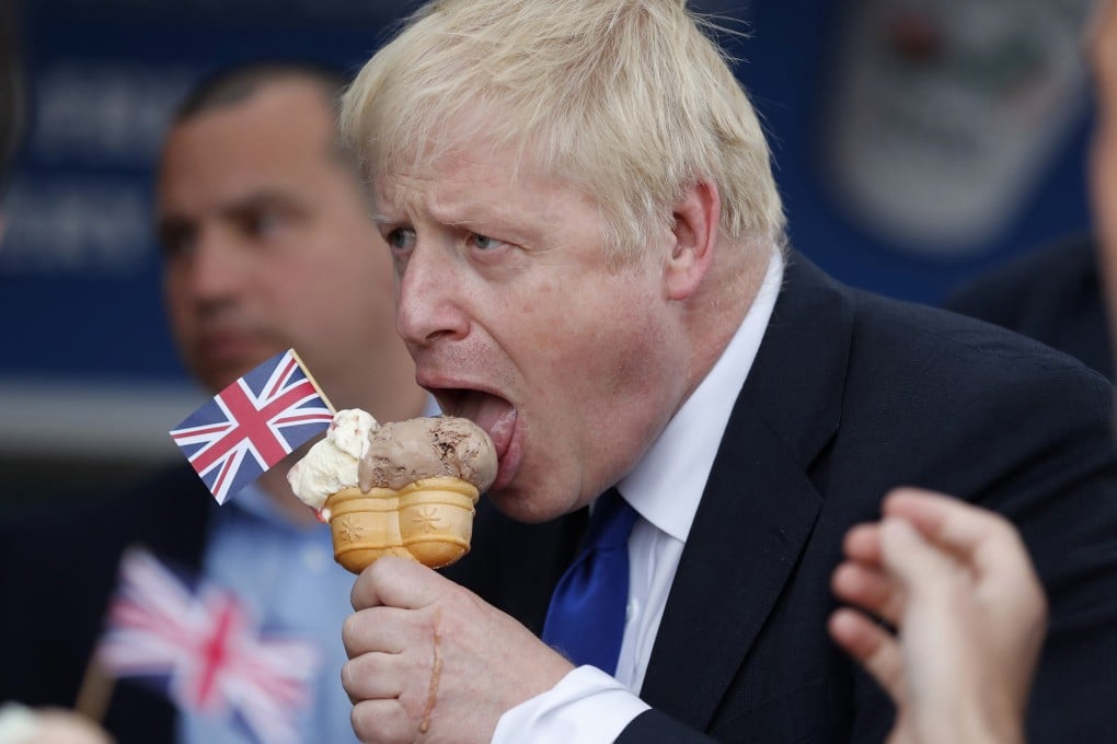 Boris Johnson, former UK foreign secretary, eats an ice cream cone while on the hustings. Photo: Bloomberg