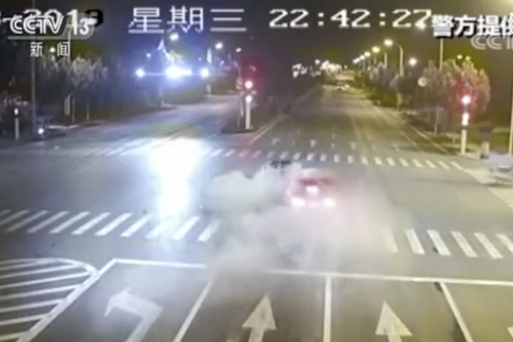 Footage from an intersection in Yongcheng, Henan shows the BMW being propelled across the road before bursting into flames. Photo: Weibo