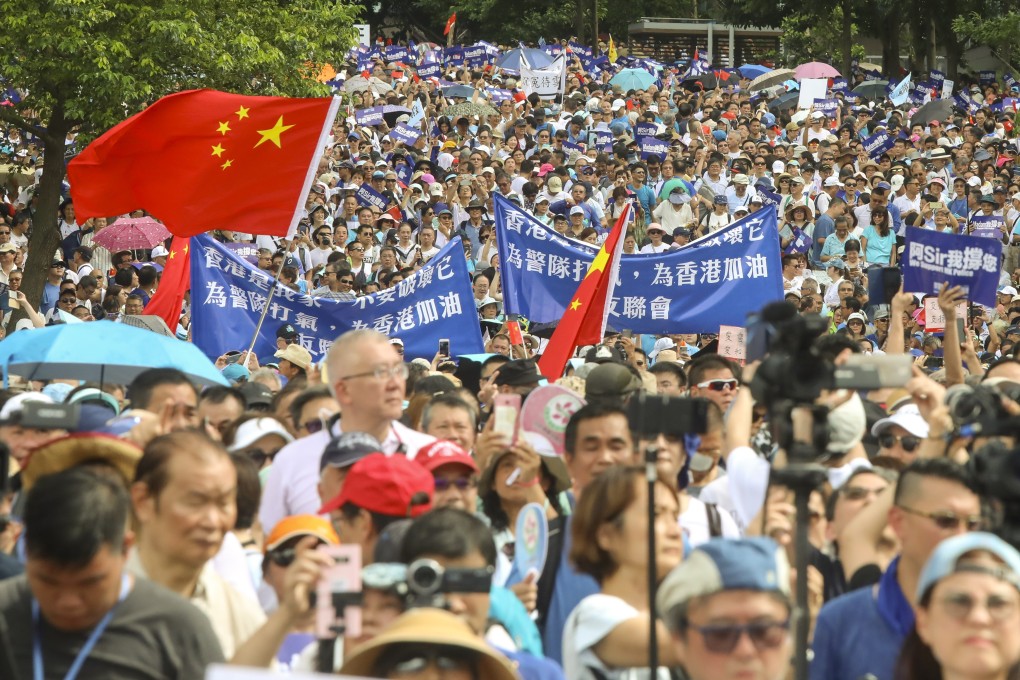 Protesters hold a mass rally in support of the police outside the government offices in Tamar on June 30. Photo: K. Y. Cheng