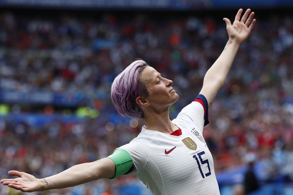 Megan Rapinoe celebrates after opening the scoring. Photo: EPA