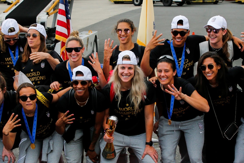 US women soccer players celebrate as they arrive in New Jersey with the Fifa Women’s World Cup on Monday. Photo: Reuters