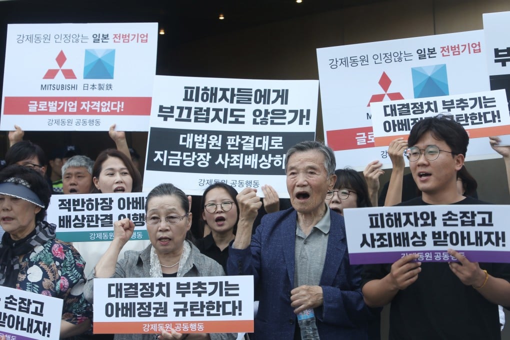 South Korean demonstrators urge a boycott of Japanese goods. Photo: EPA