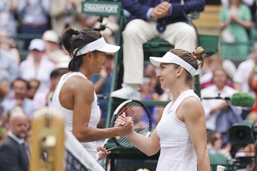 Zhang Shuai and Simona Halep shake hands after their Wimbledon quarter-final. Photo: Kyodo