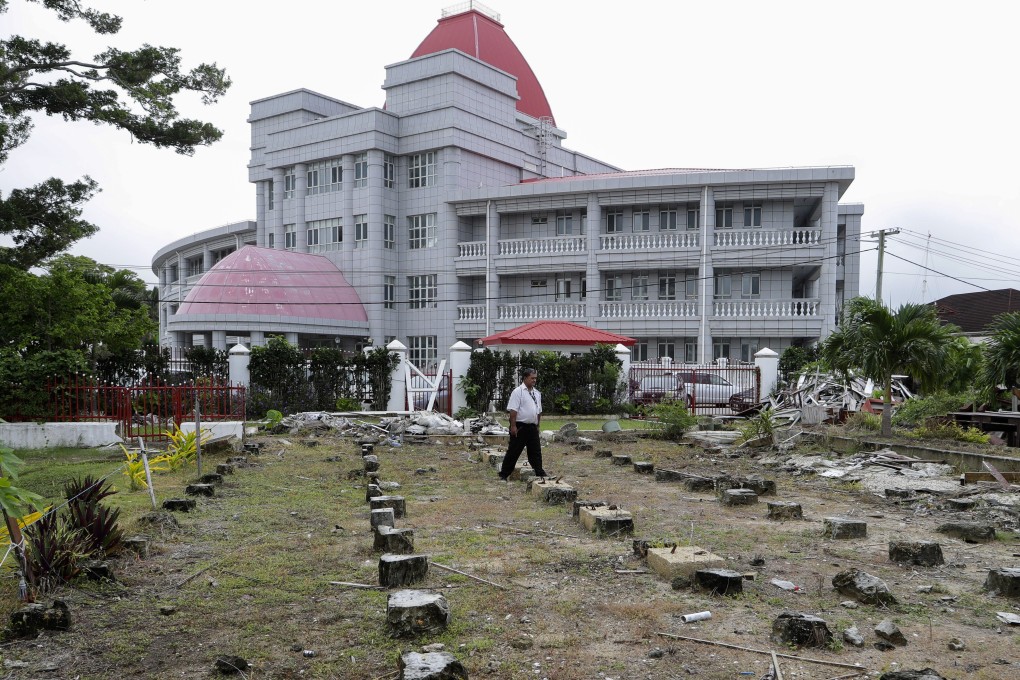 After Cyclone Gita damaged Tonga’s Parliament House last year, the government suggested China might like to pay to rebuild it. Photo: AP