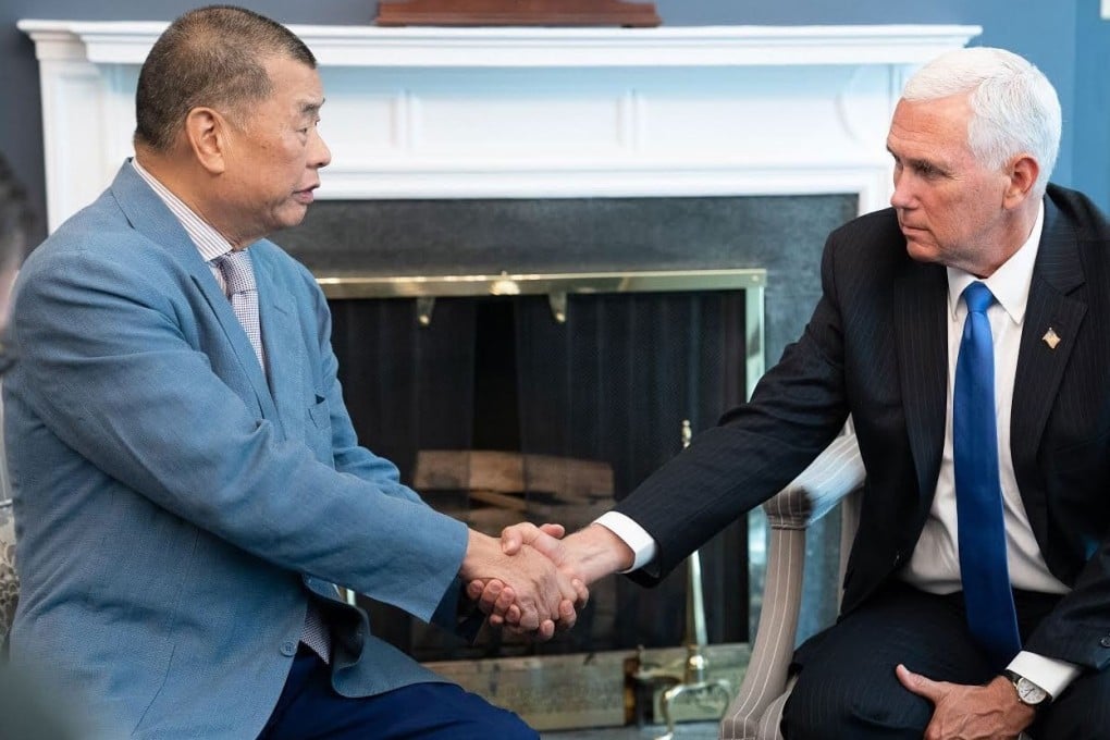 Hong Kong media mogul Jimmy Lai (left) and US Vice-President Mike Pence in the White House on Monday. Photo: Mark Simon